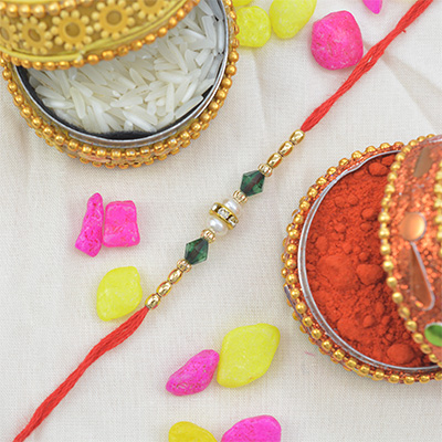 Golden Glow Diamond and Golden Beaded Beautiful Thread Rakhi