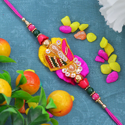 Unique and Trendy Zardosi Rakhi with Glorious Flower Beads